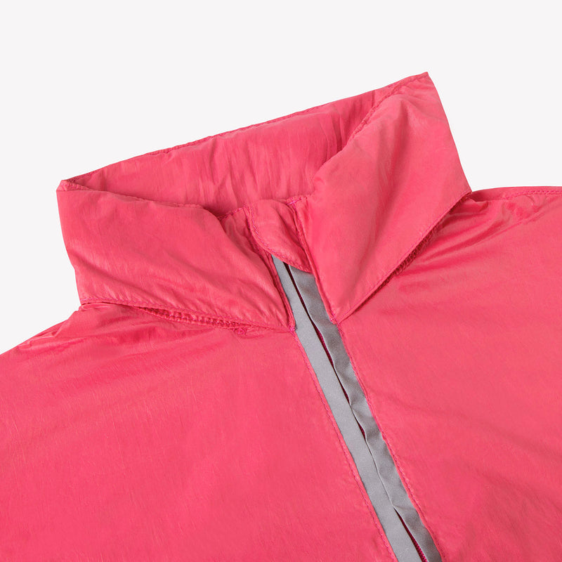 Chamarra rompevientos unisex y short biker Terra con tecnología push up.